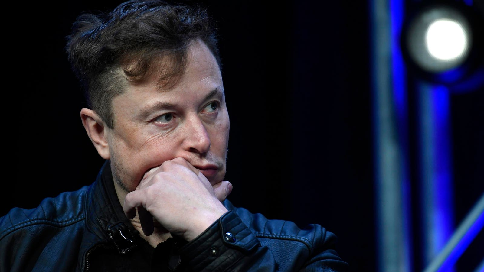 Tesla Stock Tumbles on AI Hype Concerns and Robotaxi Delay