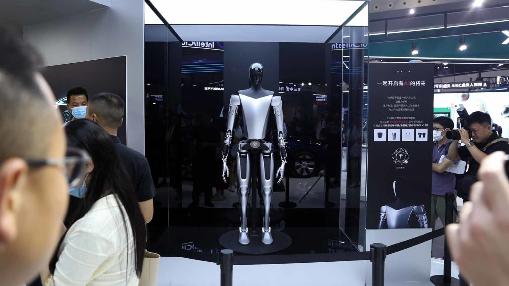 Elon Musk Unveils Vision for Tesla’s Optimus Androids